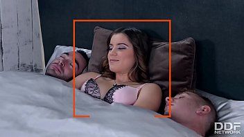 play Two cocks fight a brunette's throat and pussies